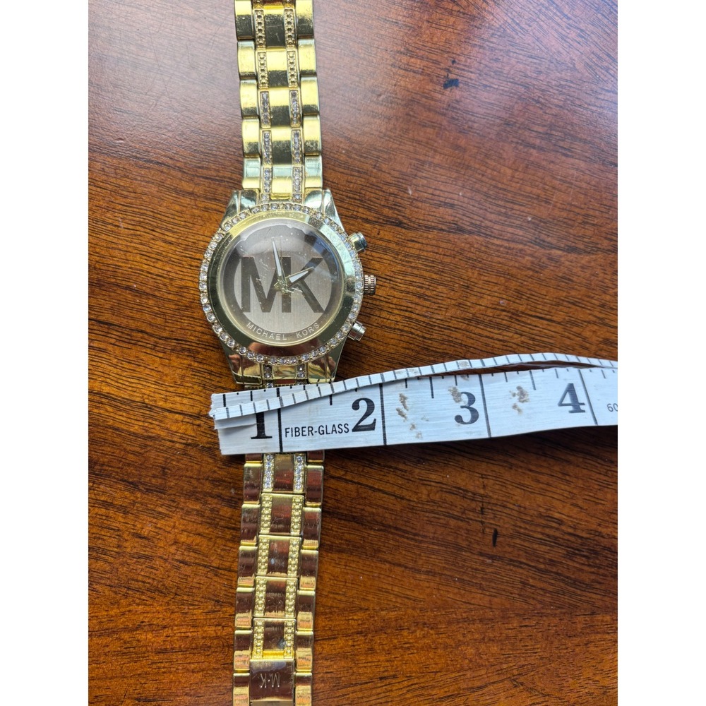 Michael Kors Ladies' Gold-Tone Stainless Steel Crystal-Accented Watch - Picture 5 of 7